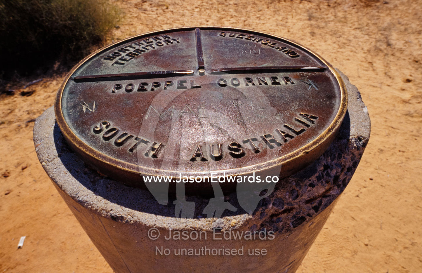 Marking the borders South Australia, Northern Territory and Queensland Simpson Desert Conservation Park, South Australia, Northern Territory and Queensland Australia.