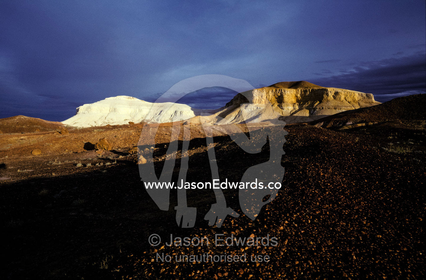 The ancient sandstone formations of the Breakaway Ranges at sunset. Breakaway Ranges Reserve, South Australia.