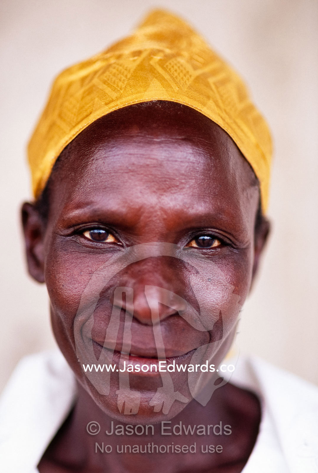 The smooth skin and elegant features of a woman from Eastern Uganda. Tororo District, Uganda.