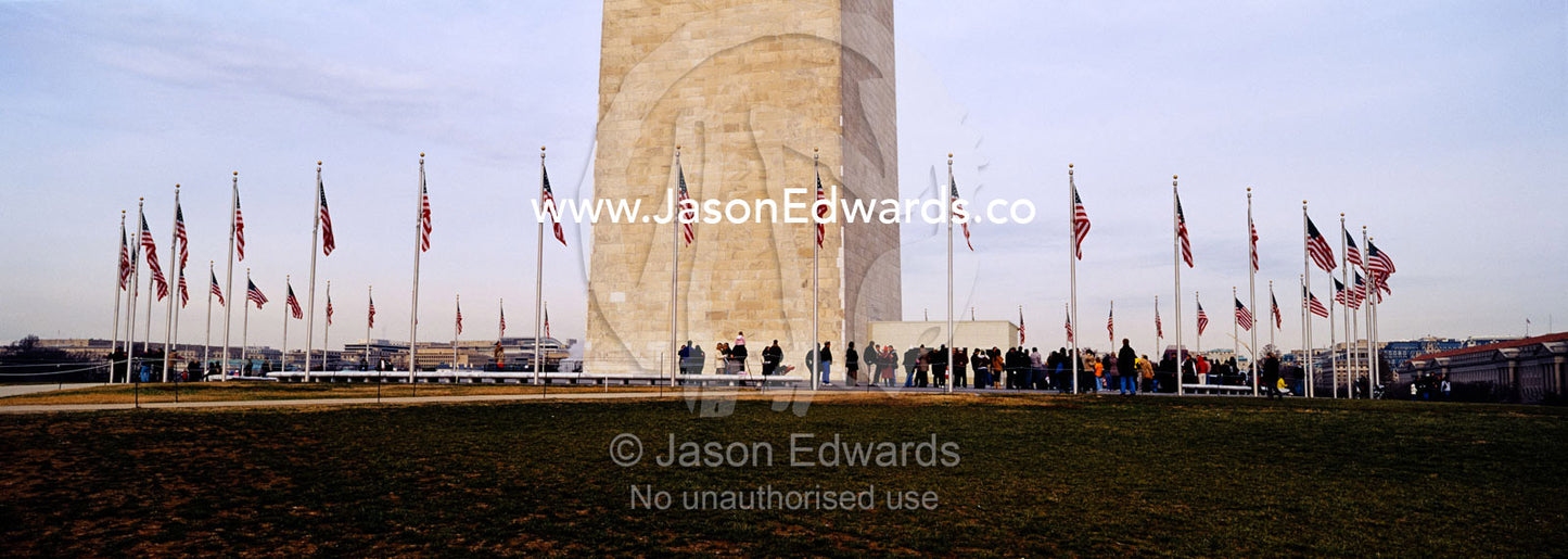 The American flag, Old Glory, flies near the Washington Monument. Washington DC, USA, United States of America.