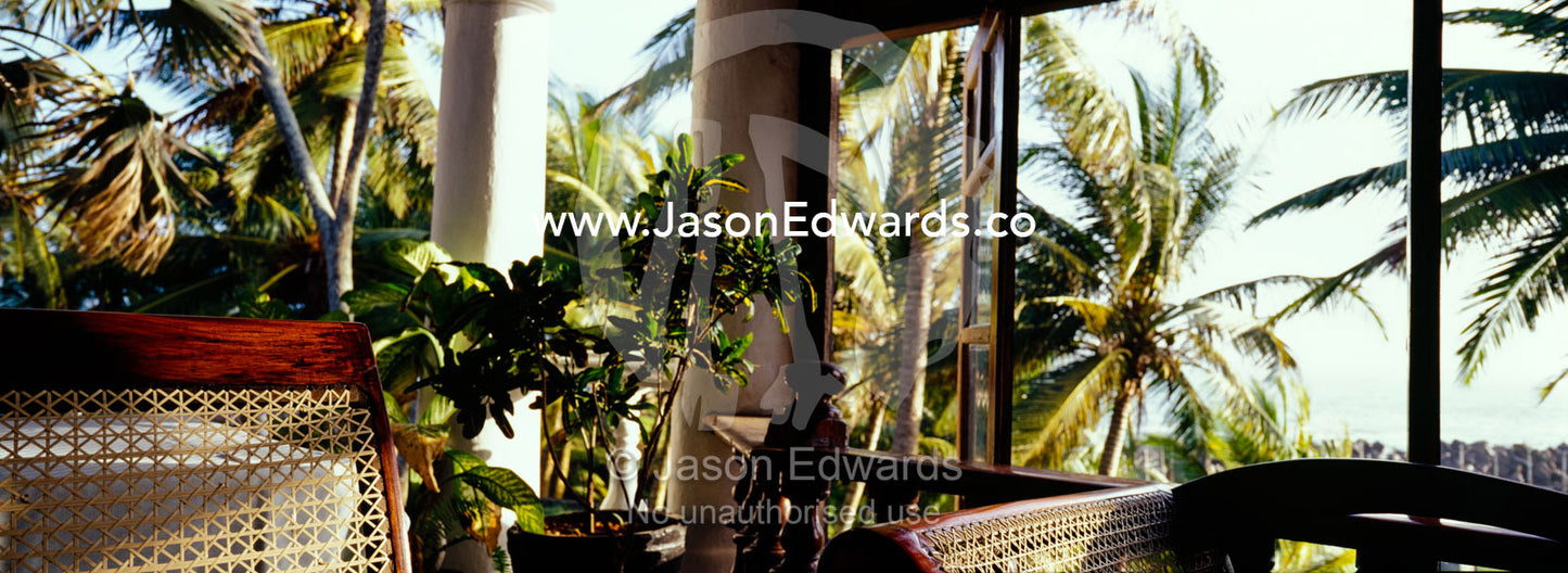 Dappled light filters into a relaxing sun room at the Closenberg Hotel Closenberg Hotel Galle, Sri Lanka. Galle, Sri Lanka.