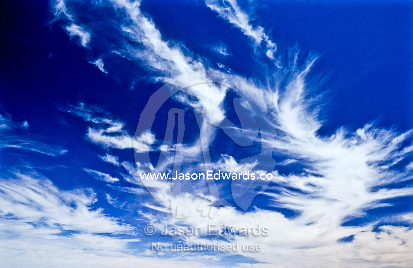 Windswept clouds float over the desert in outback South Australia. Andamooka, South Australia, Australia.