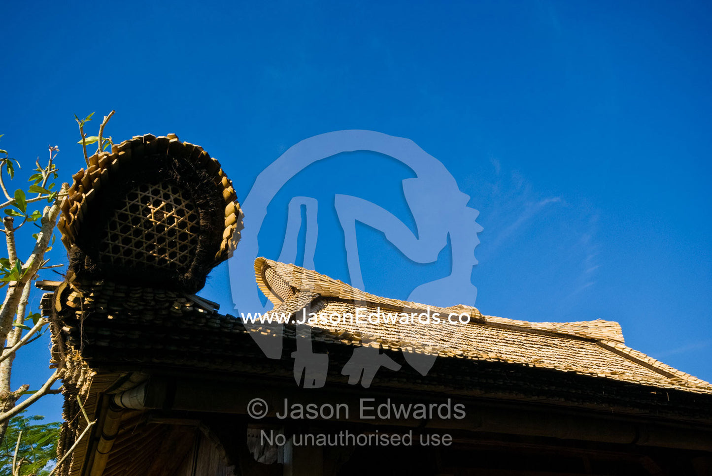 An ancient and rare style of bamboo tiled roof on an exclusive villa. The Temple Lodge, Bukit Peninsula, Bali, Indonesia.