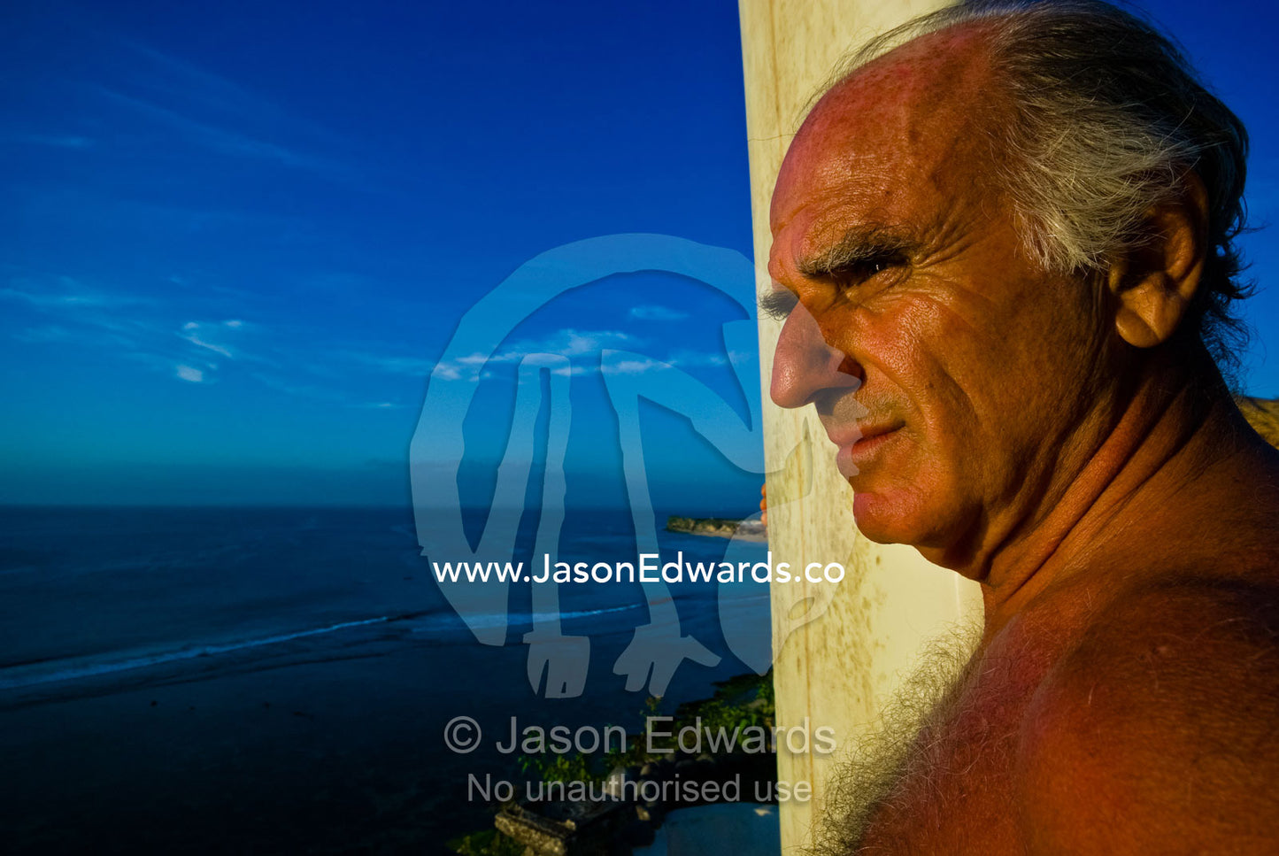 Italy's oldest surfer is a picture of health as he searches for waves. The Temple Lodge, Bukit Peninsula, Bali, Indonesia.