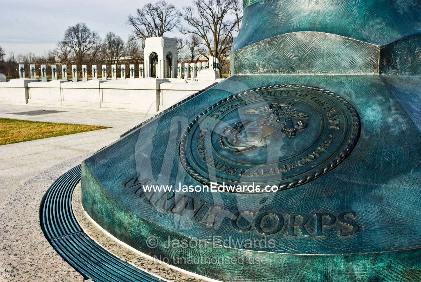 A bronze monument commemorates Marine Corp veterans of World War 2. World War II Memorial, National Mall, Washington, DC, United States of America.