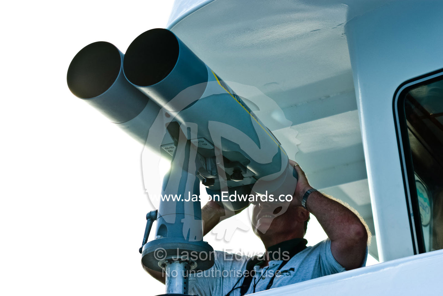 Ornithologists use huge binoculars known as Big Eyes to scan the sky. Coral Sea, Coral Sea Islands Territory, Australia.