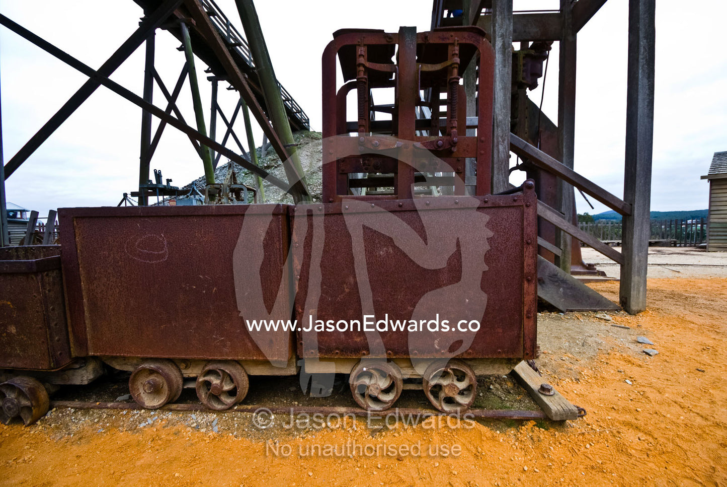 Heavy antique steel carriages used to remove ore from gold mines. Ballarat, Victoria, Australia.