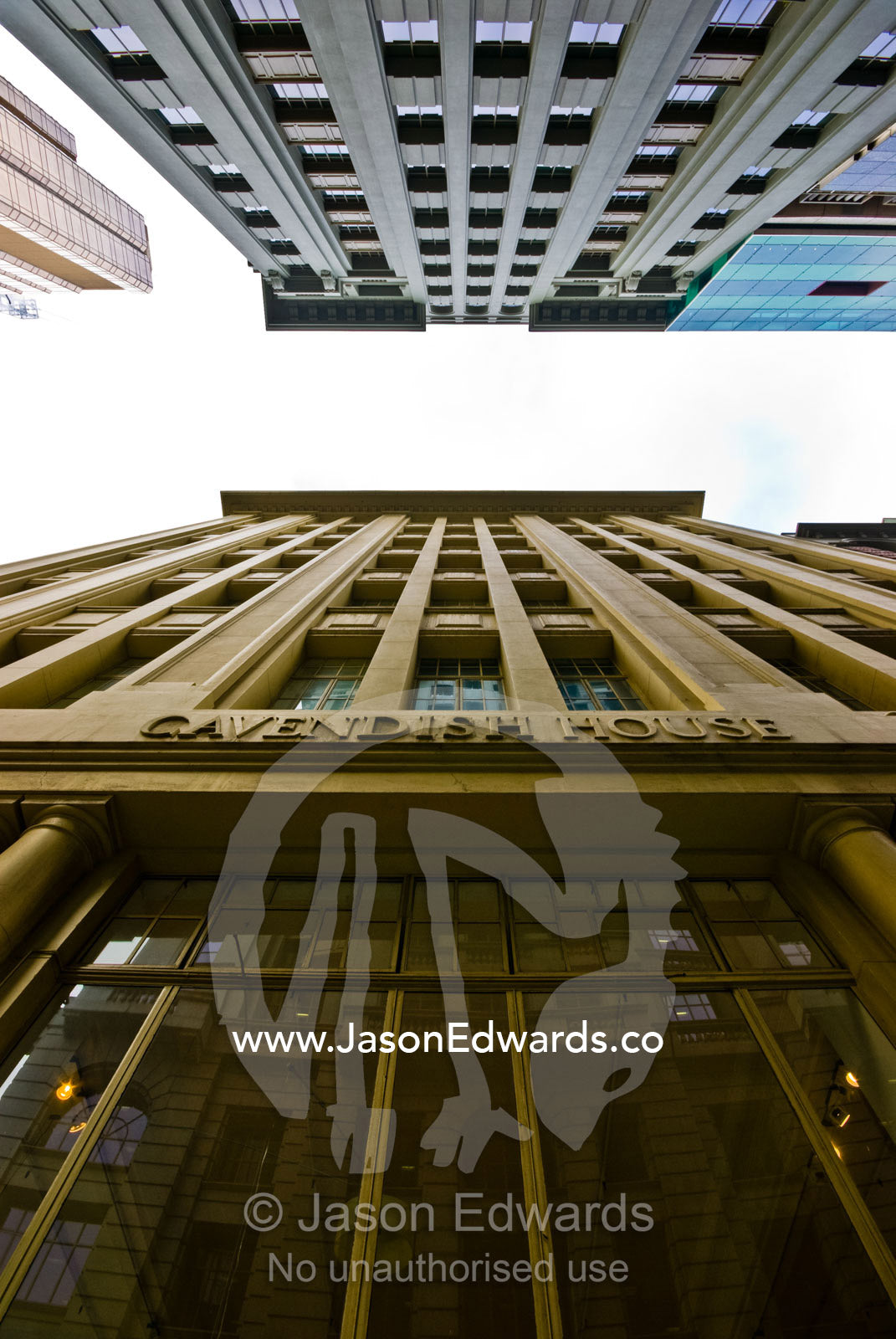 A city Art Deco apartment facade opposite a modern office complex. Flinders Lane, Melbourne, Victoria, Australia