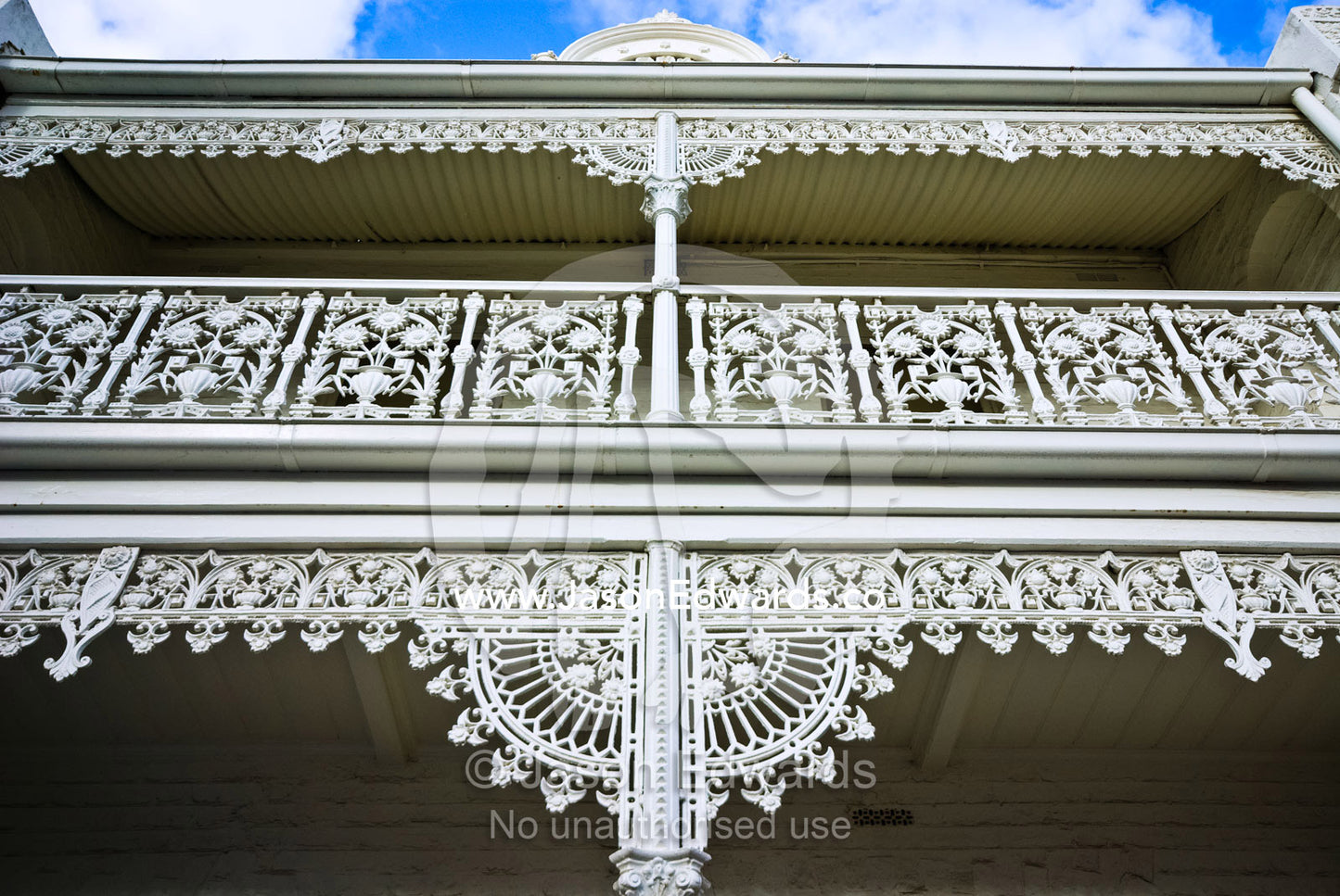 Nineteenth century steel lattice on the balcony of a terrace house. Fitzroy North, Victoria, Australia