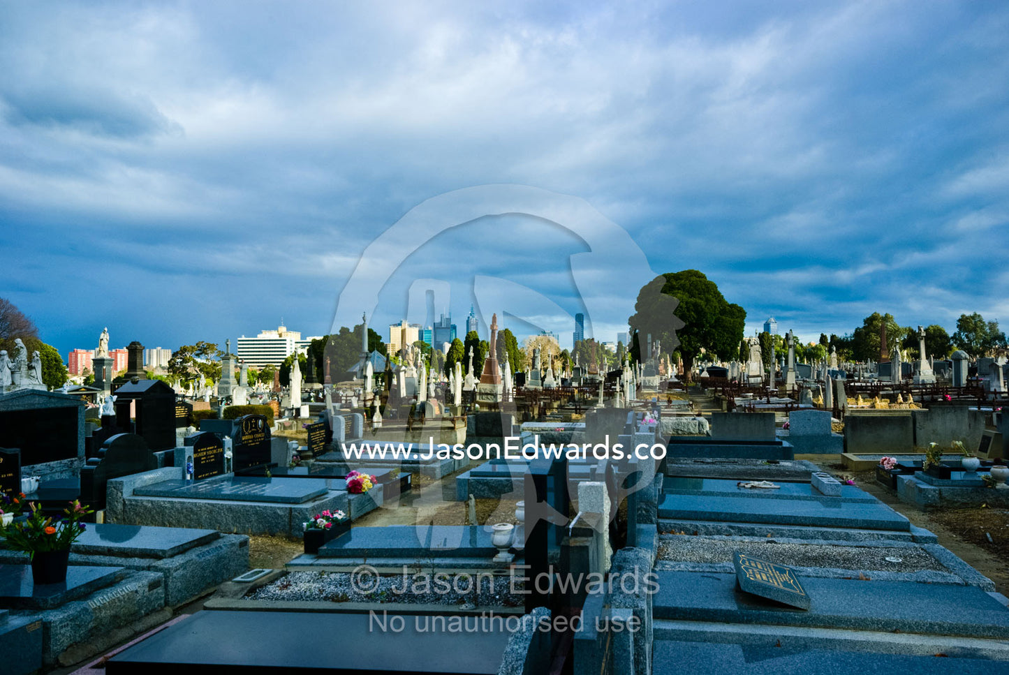 Tombstones and graves fill an old and vast inner city graveyard. Melbourne General Cemetery, Parkville, Victoria, Australia