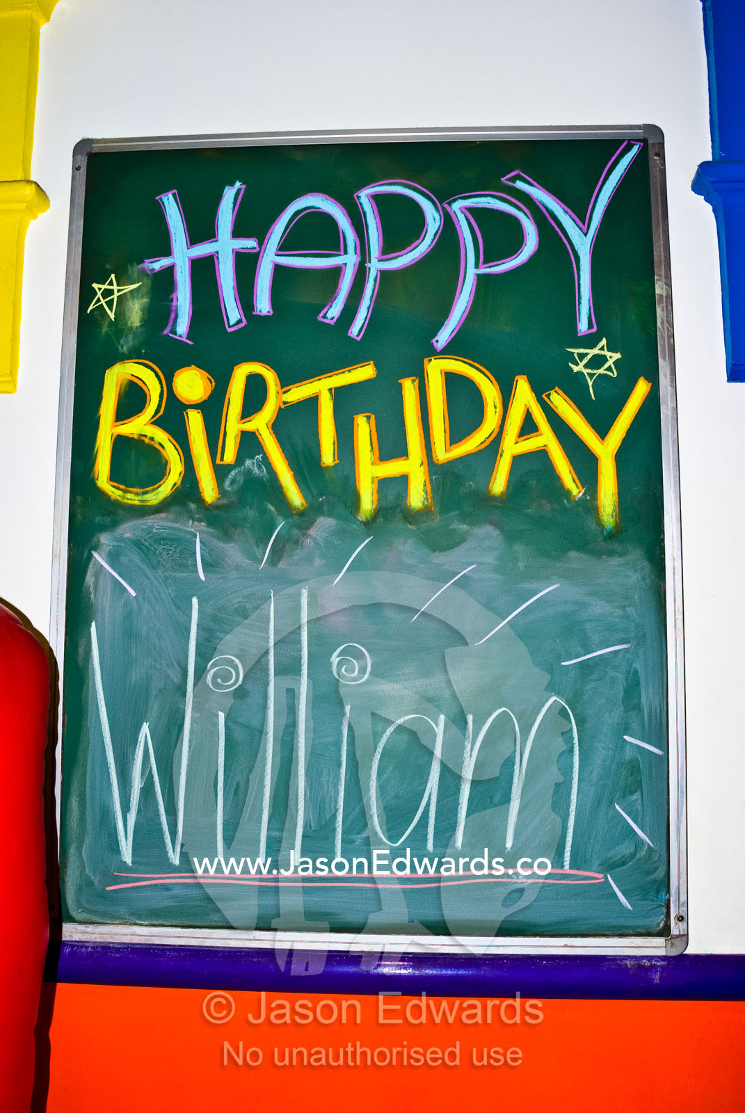 Birthday wishes written on a chalkboard in a childrens play centre. Hawthorn, Victoria, Australia