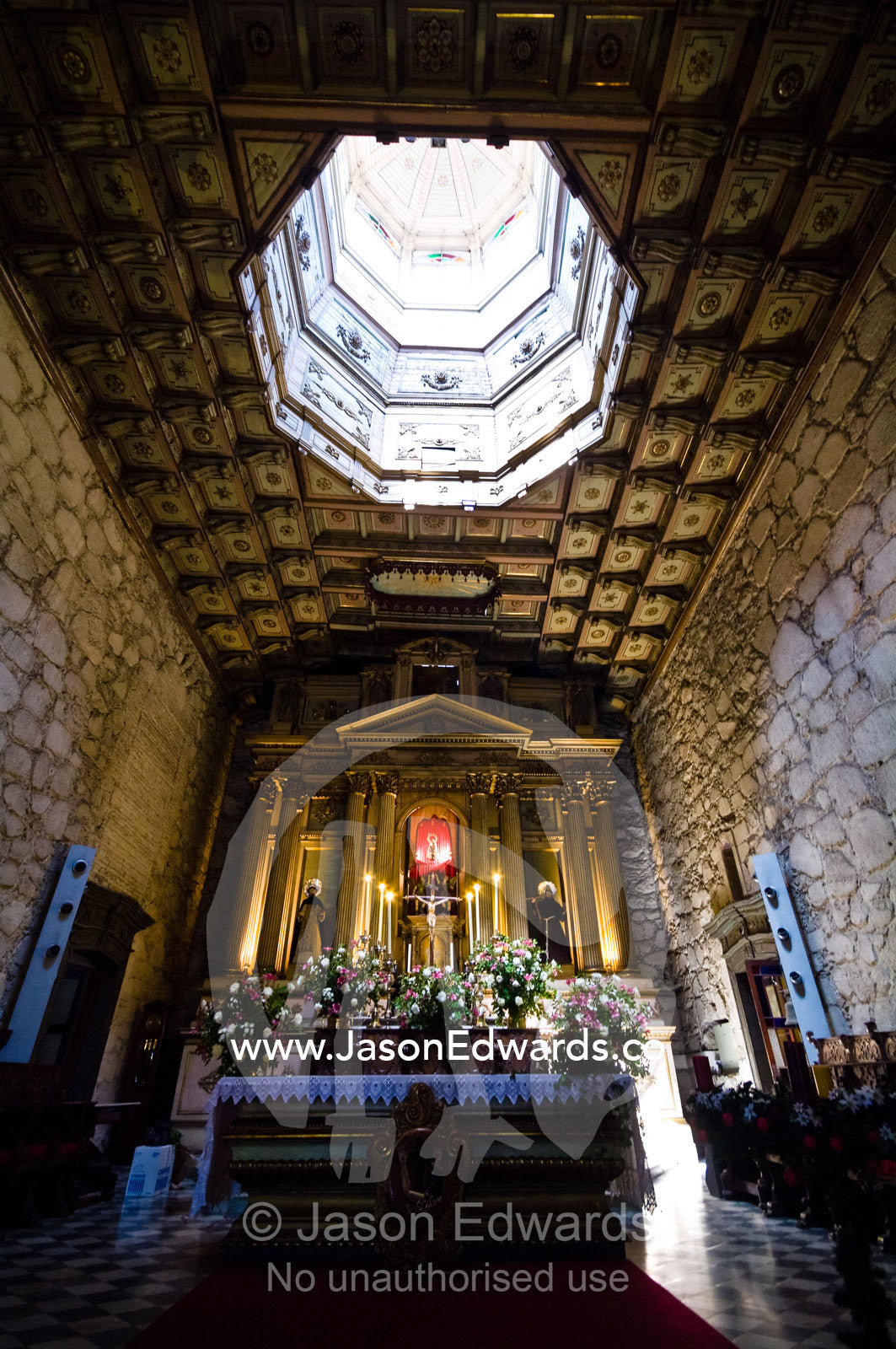 The Virgen del Socorro presiding over the neoclassical high altar. Iglesia San Francisco, Santiago, Chile