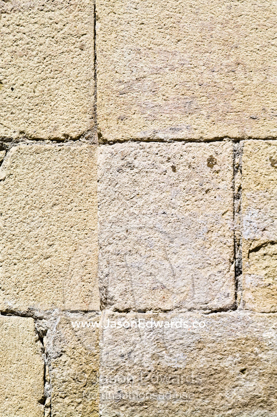 Detail of a stone wall at the entrance to an ancient Christian church. Iglesia San Francisco, Santiago, Chile