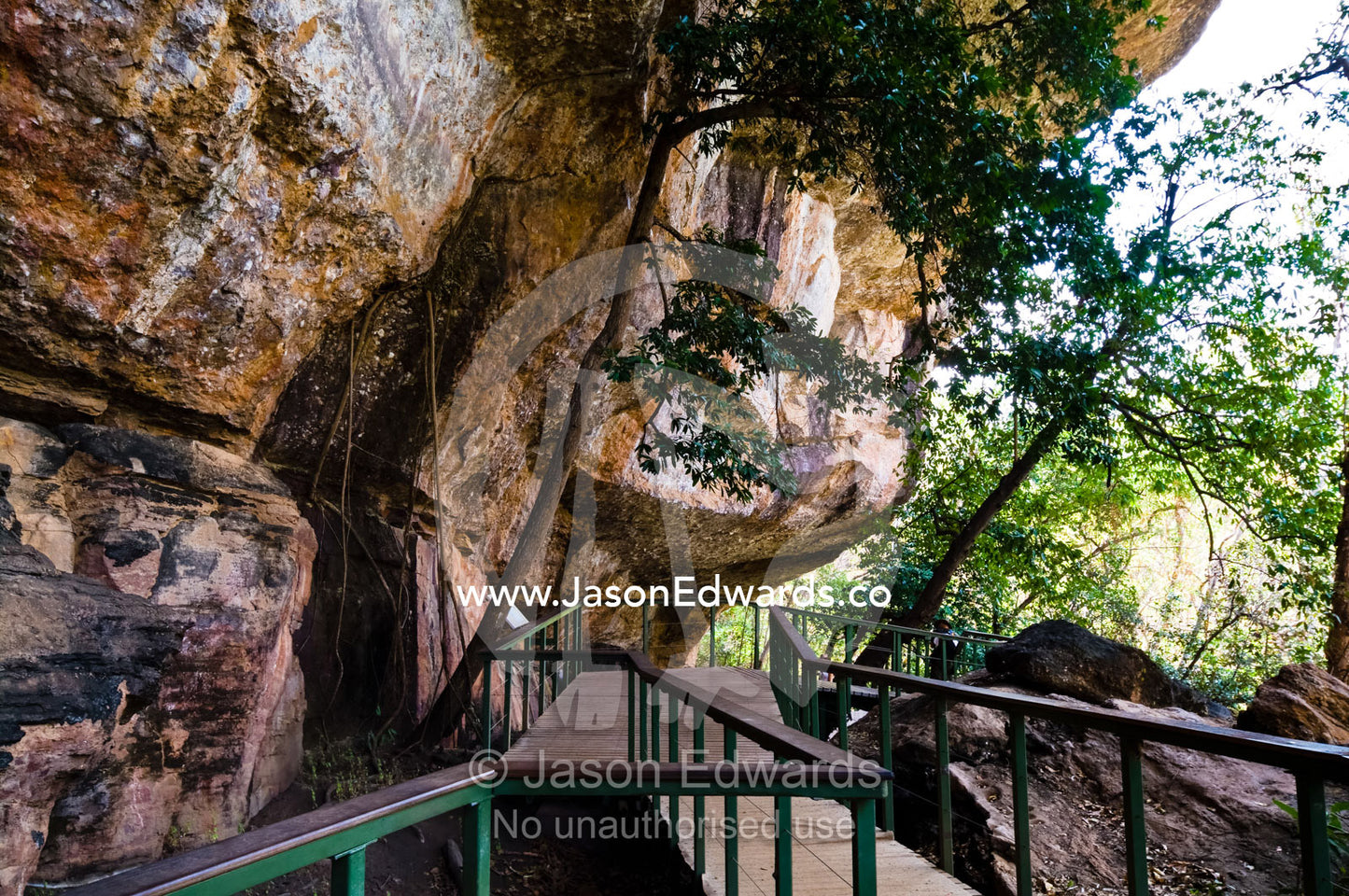 A raised boardwalk protects fragile Aboriginal Rock Art from tourists. Nourlangie, Nawurlandja, Anbangbang Billabong, Kakadu National Park, Northern Territory, Australia.