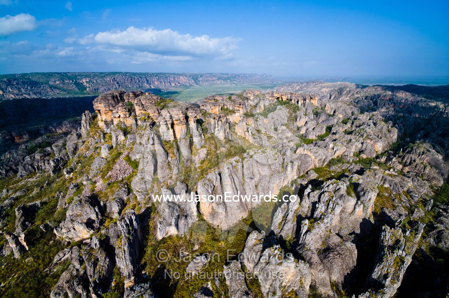 Weathered rugged and deep sandstone gorges beneath an ancient plateau. Dinosaur Valley, Arnhem Land Border, Kakadu National Park, Northern Territory, Australia.