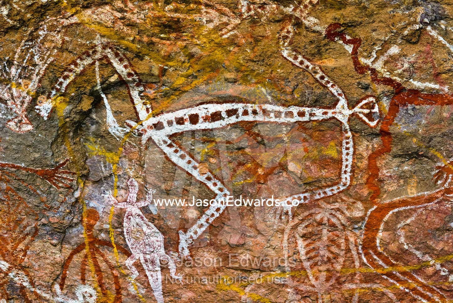 Aboriginal rock art depicts figures of Mimi Spirits on a cave wall. Nourlangie, Nawurlandja, Anbangbang Billabong, Kakadu National Park, Northern Territory, Australia.