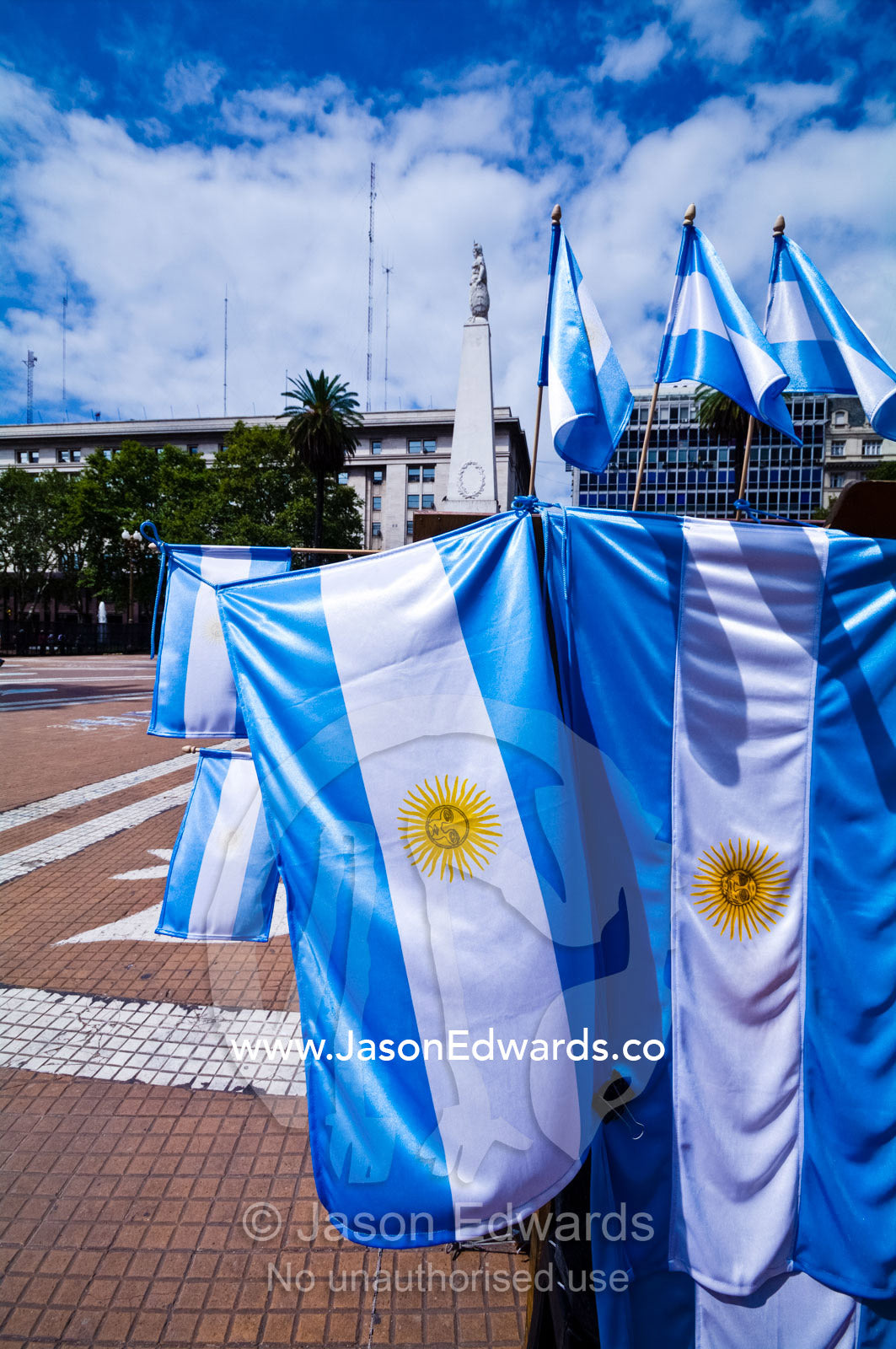 A market stall proudly selling flags from Argentina on a summers day. Plaza de Mayo, Buenos Aires, Argentina.