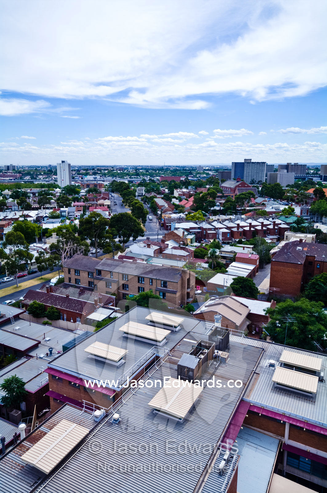 A view looking over the rooftops of an inner city terrace suburb. North Melbourne, Melbourne, Victoria, Australia.