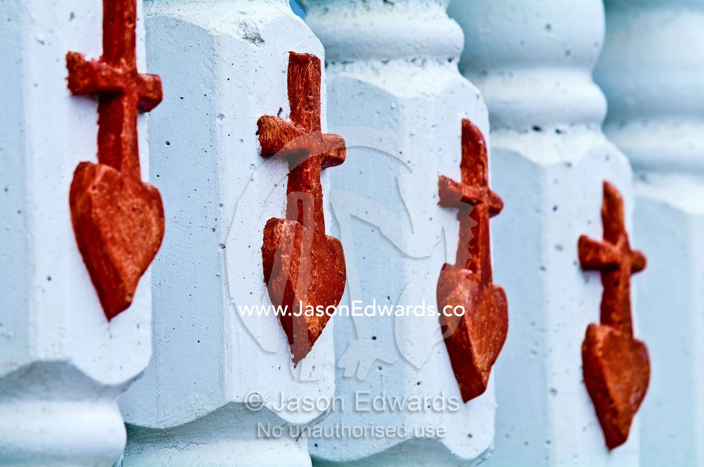 Hearts and crucifix on a fence at St Josephs Cathedral Catholic Church Port of Refuge, Neiafu, Vava'u Island Group, Pacific Ocean, Oceania, Kingdom of Tonga.