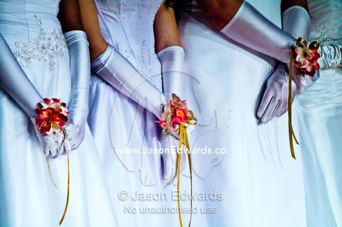 Teenage girls in white dresses on the dance floor at a debutante ball. Melbourne, Victoria, Australia.