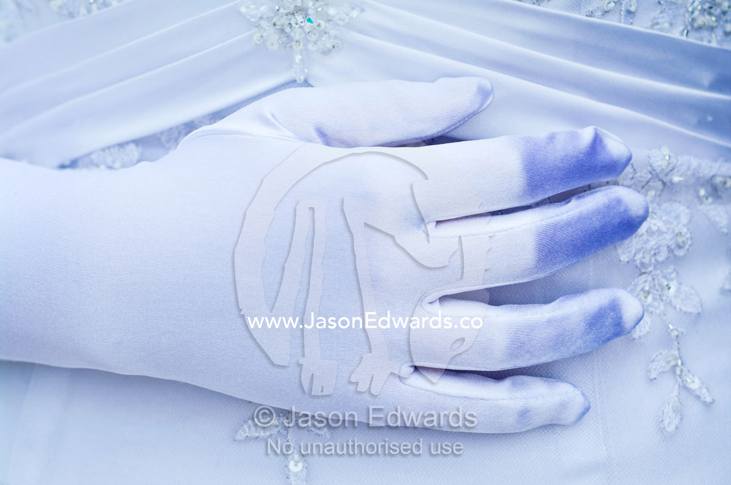 A teenage girl prepares to attend her debutante ball in a white dress. Melbourne, Victoria, Australia.
