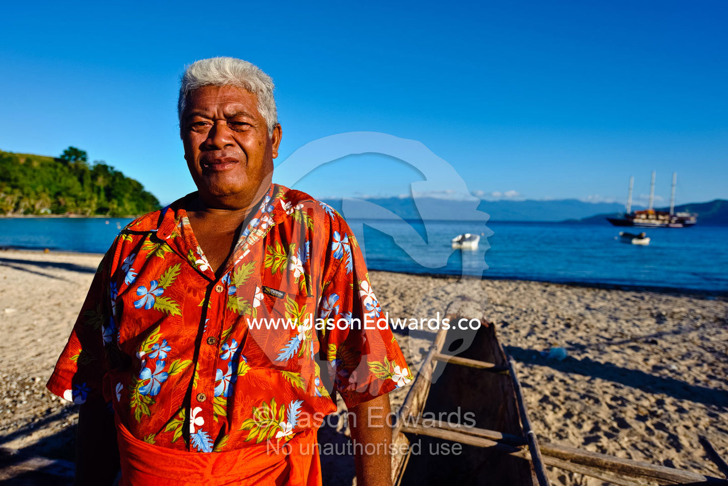 A Government Minister for Tourism on the beach of his island home. Kioa Island, Somosomo Strait, Pacific Ocean, Fiji Islands.