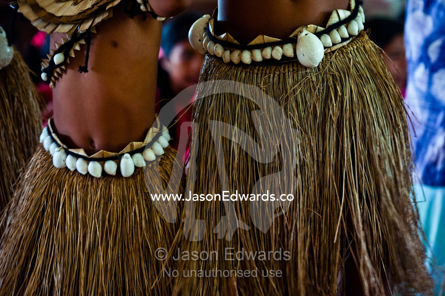 Micronesian children dance in grass skirts and seashell belts. Tabiang Village, Rabi Island, Somosomo Strait, Pacific Ocean, Fiji Islands.