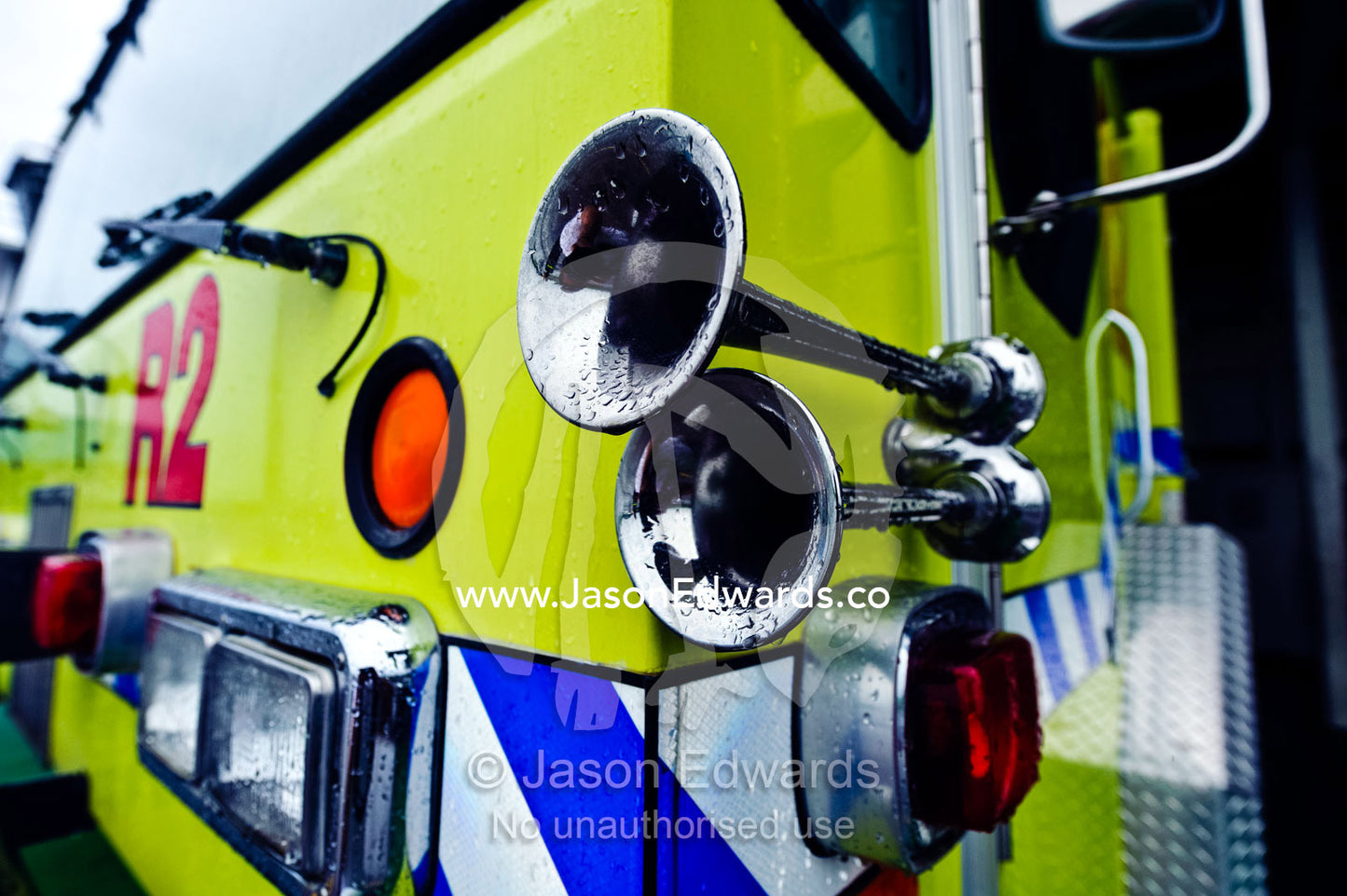 The polished silver horns of a airport emergency fire engine truck. Nausori Airport, Viti Levu Island, Pacific Ocean, Fiji Islands.