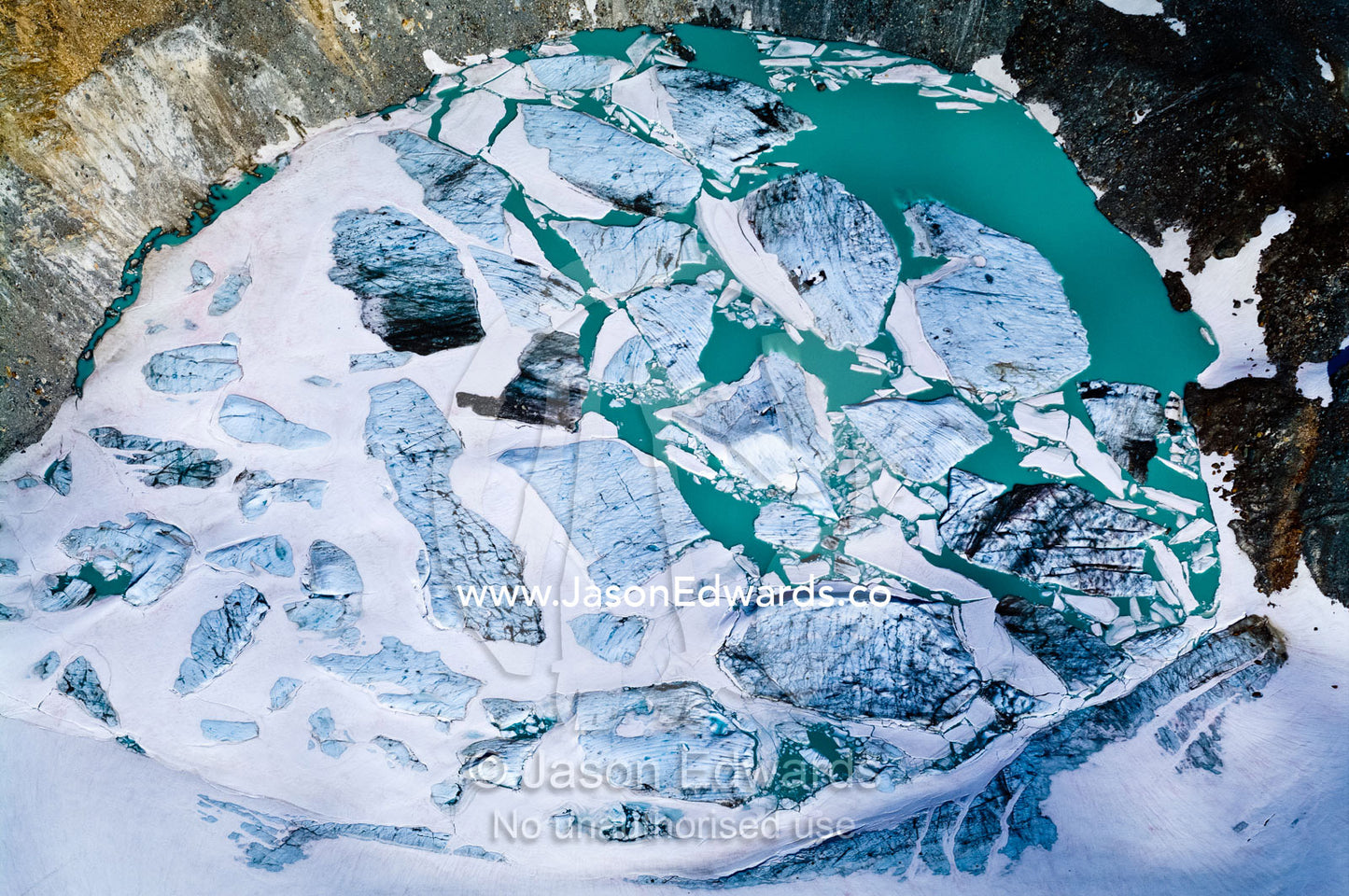 Massive icebergs gather in an alpine lake by a glacier fracture zone. Ushuaia, Martial Mountains, Fuegian Andes, Ushuaia Bay, Tierra del Fuego Archipelago, Straits of Magellan, Tierra del Fuego Province, Patagonia, Argentina.