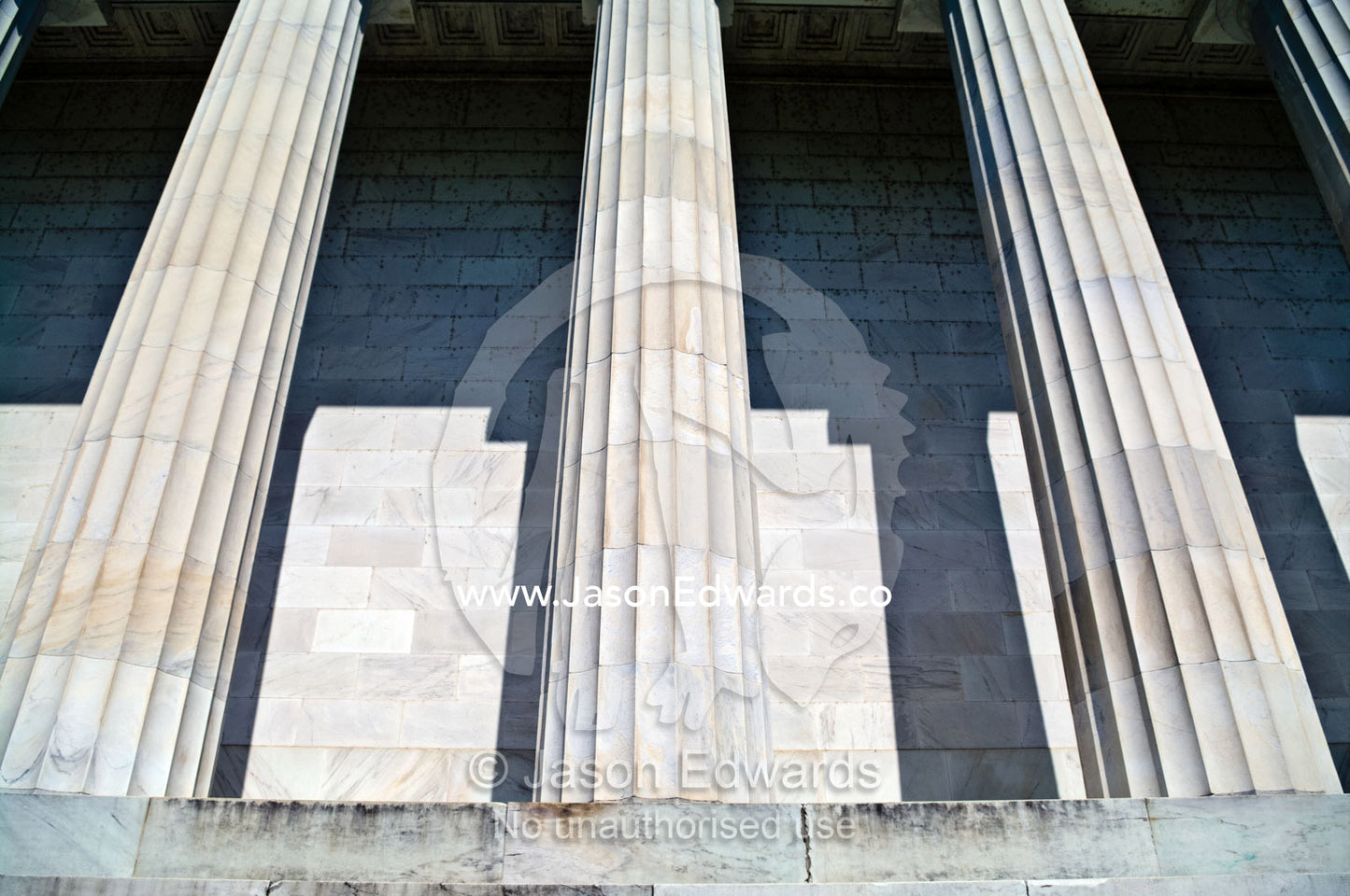 Marble Greek Doric columns support the roof of the Lincoln Memorial. Lincoln Memorial, National Mall, Washington, District of Columbia, United States of America.