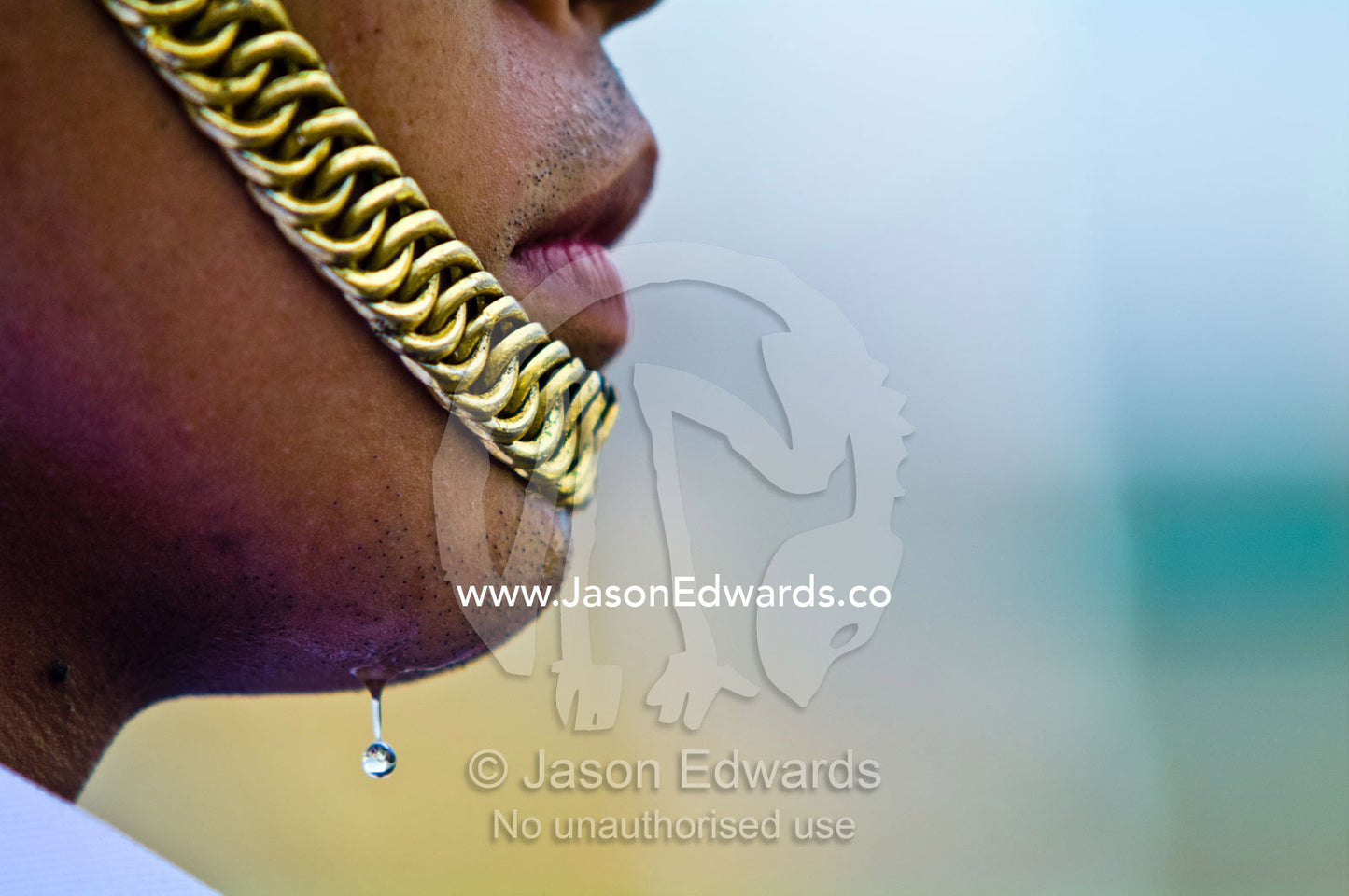 A drop of sweat drips from the chin of a soldier of the Kings Guard. Chakri Maha Prasad, The Grand Palace, The Lord's Supreme Palace, Royal Palace, Bangkok, Thailand.