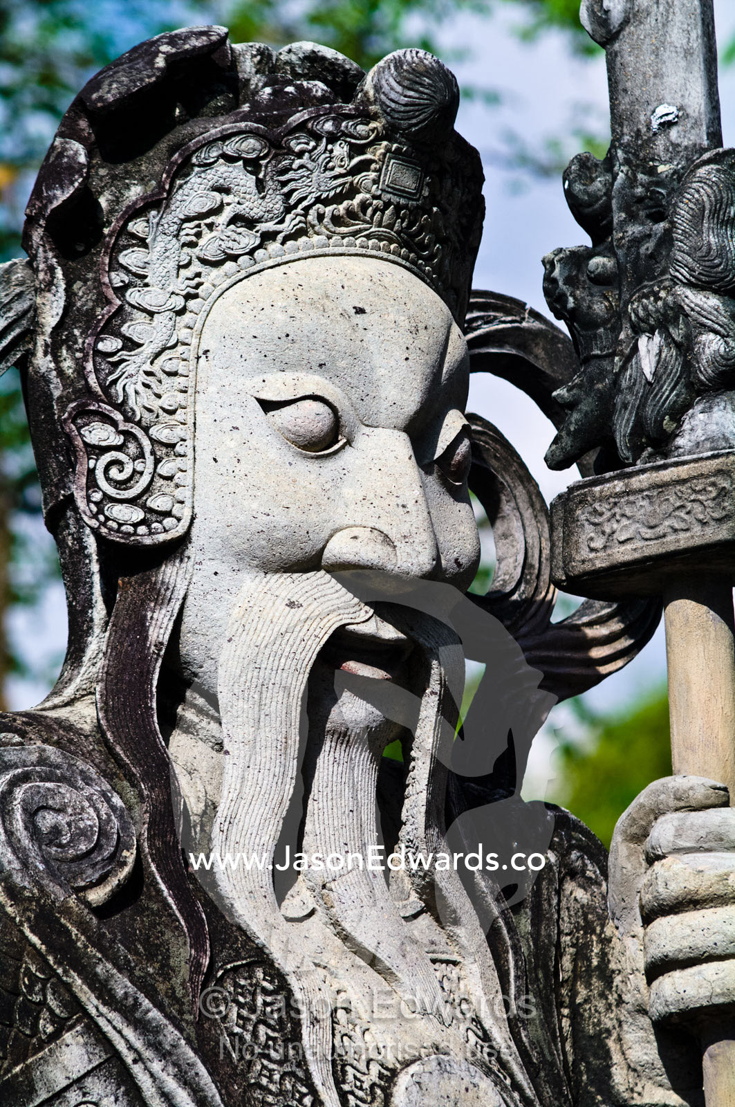 Detail of a statue once used as ballast in a Chinese merchant ship. Wat Pho, Temple of the Reclining Buddha, Wat Chetuphon, Phra Nakhon District, Rattanakosin District, Bangkok, Thailand.