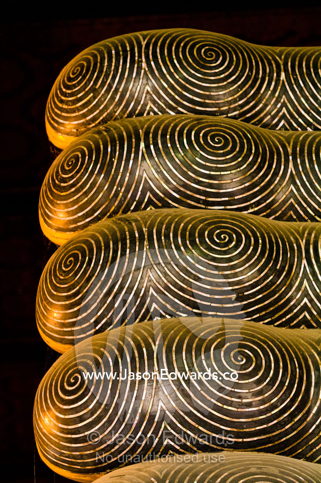 Mother of Pearl spirals inlaid into the toes of the Reclining Buddha. Wat Pho, Temple of the Reclining Buddha, Wat Chetuphon, Phra Nakhon District, Rattanakosin District, Bangkok, Thailand.