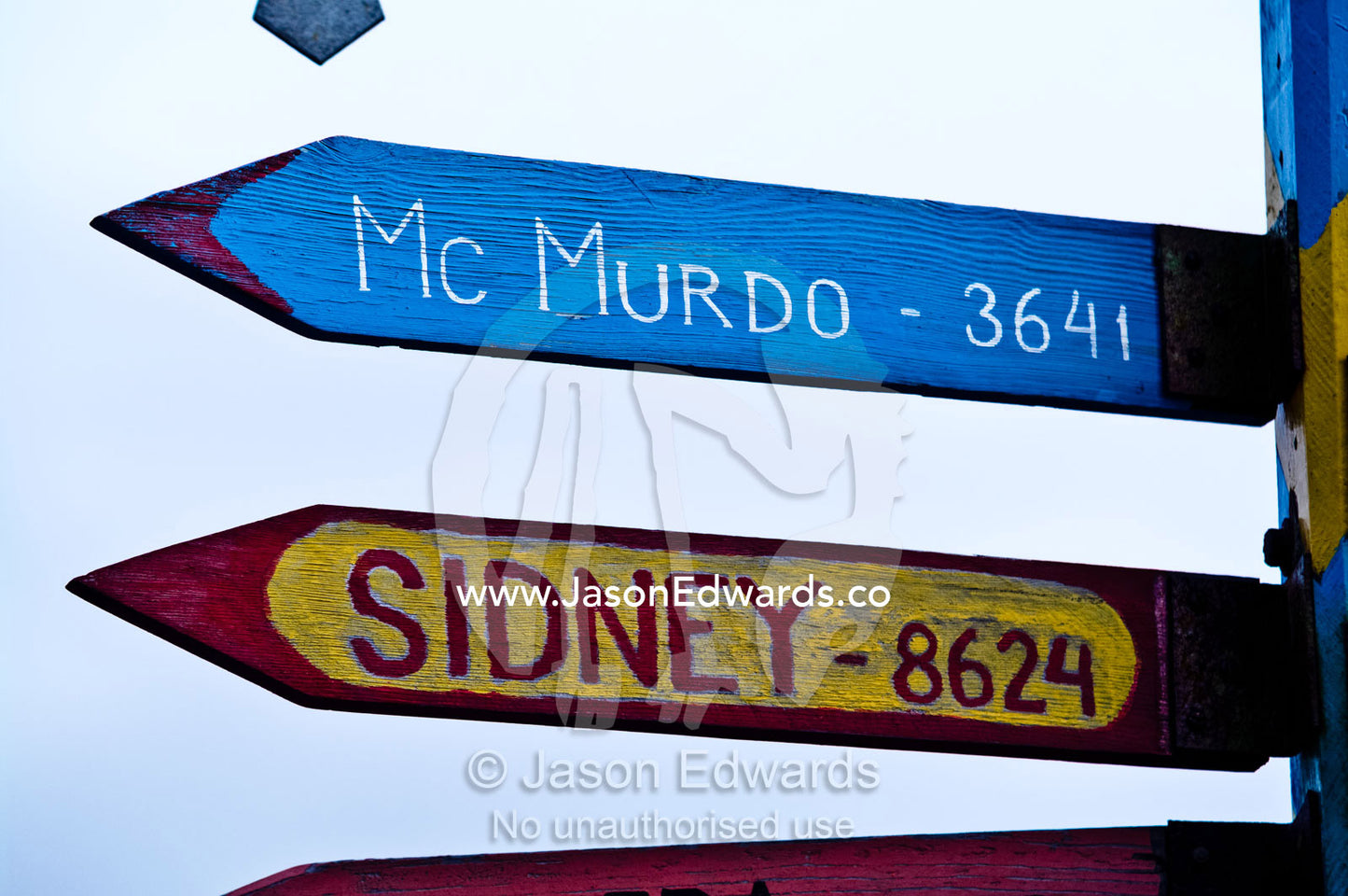 A directional sign at a Ukrainian station points to distant cities. Vernadsky Antarctic Research Base, Galindez Island, Argentine Islands, Faraday Islands, Antarctic Peninsula, Antarctica.