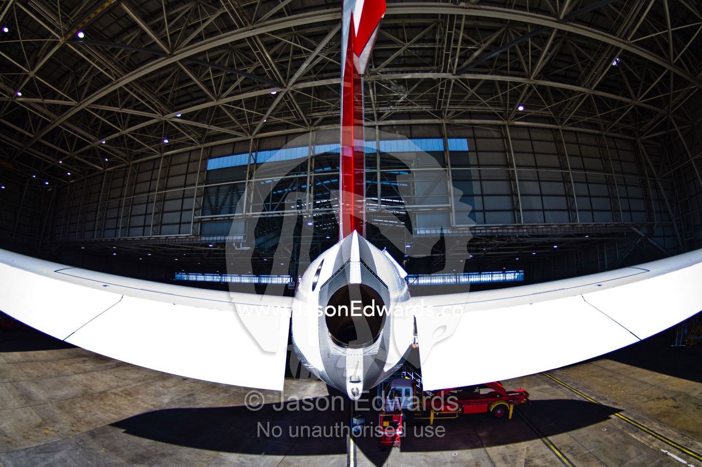 The empennage and auxiliary power unit exhaust of an A380. Kingsford Smith Airport, Mascot, Sydney, New South Wales, Australia.