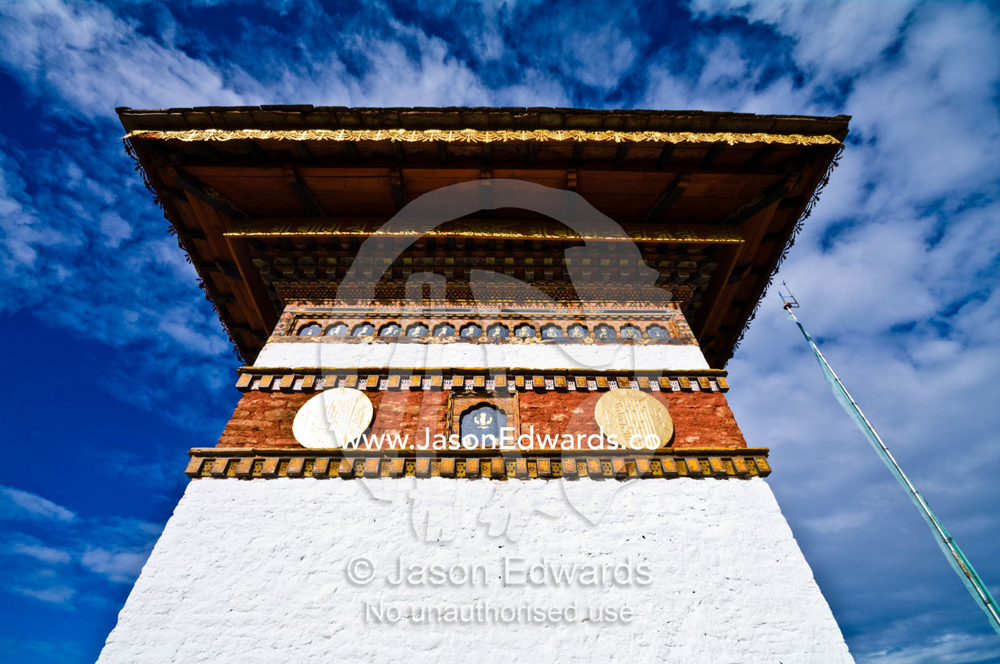 A decorated tiled eave on a chorten dedicated to the King of Bhutan. 108 Druk Wangyal Khangzang Chortens, Dochula Pass, Thimphu District, Bhutan.