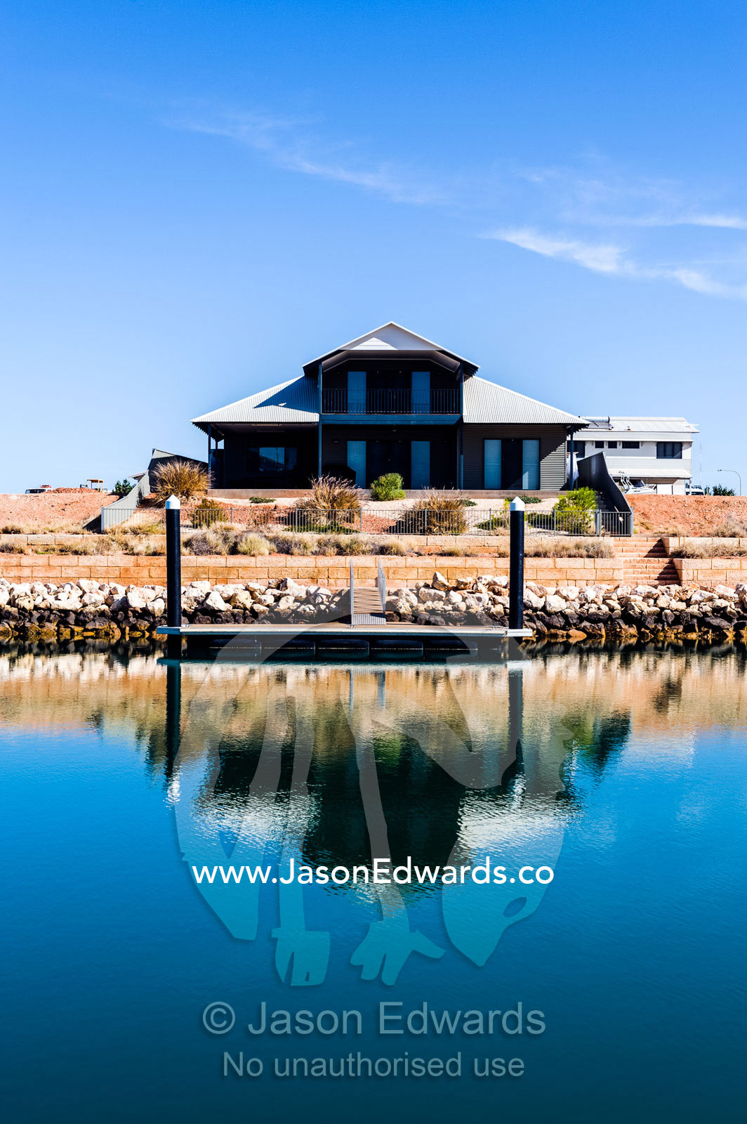 A new housing estate on a fishing mariner in outback Australia. Exmouth, Ningaloo Reef, Western Australia, Australia.