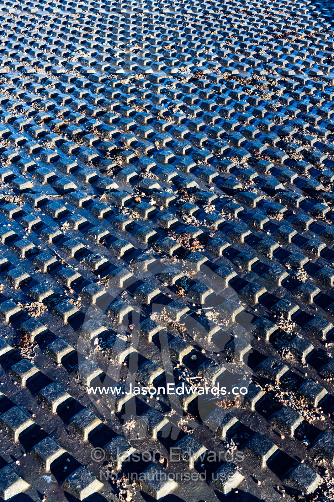 Corrugated steel ramps for loading boats into the ocean. Exmouth, Ningaloo Reef, Western Australia, Australia.