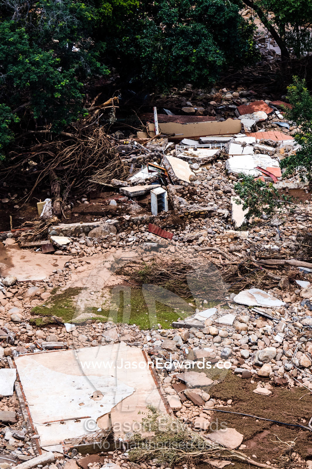 Debris and rubble from a village destroyed by flood waters. Kruger National Park, South Africa.