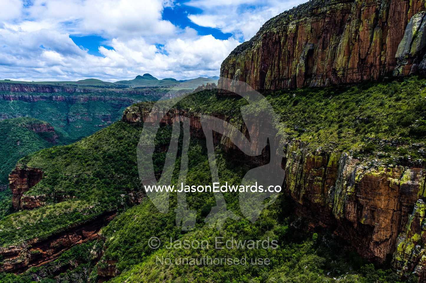 Rugged mountain canyons and cliffs shrouded in dense primeval forest. Blyde River Canyon, South Africa.