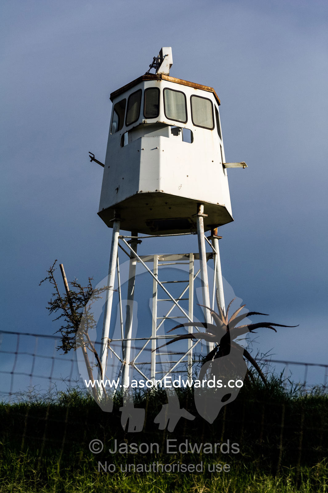 The bridge of a ship mounted on stilts as a wildlife lookout tower. The Farm Inn, Pretoria, Gauteng Province, South Africa.