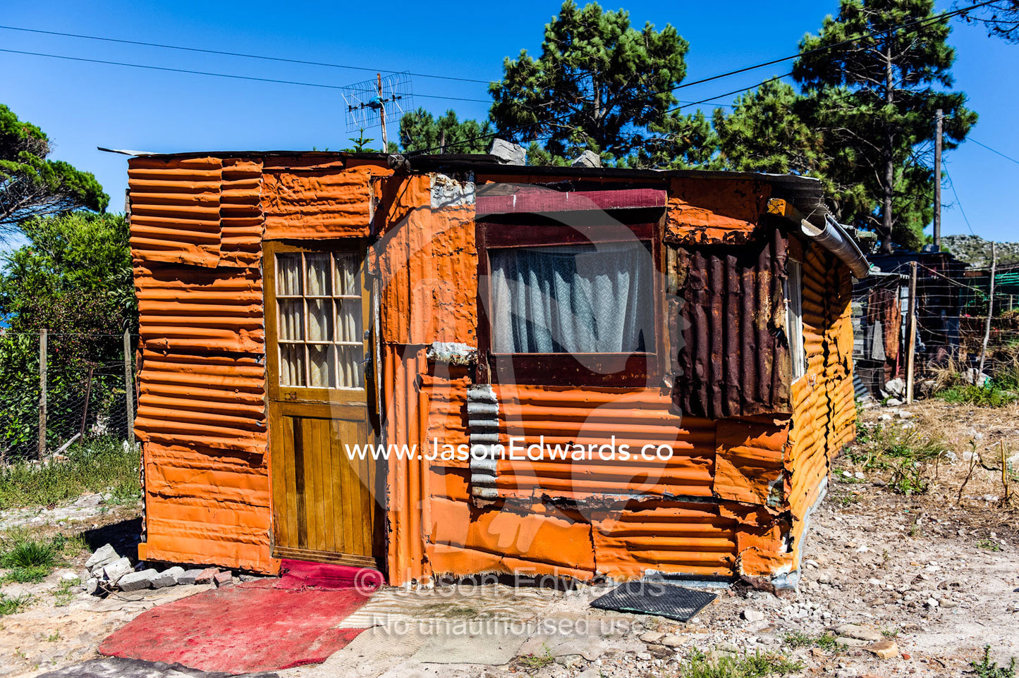 Township homes made of scrap metal for displaced refugee Africans. Red Hill Township and Pre-School, Cape Town, Western Cape, South Africa.
