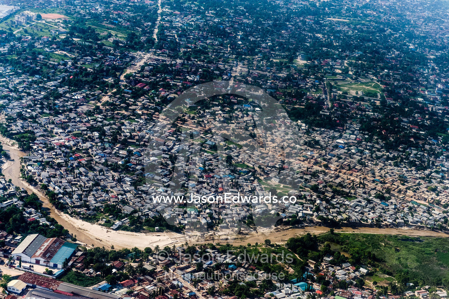 A densely populated suburban community crowded around Dar es Salaam's urban sprawl. Dar es Salaam, Tanzania.