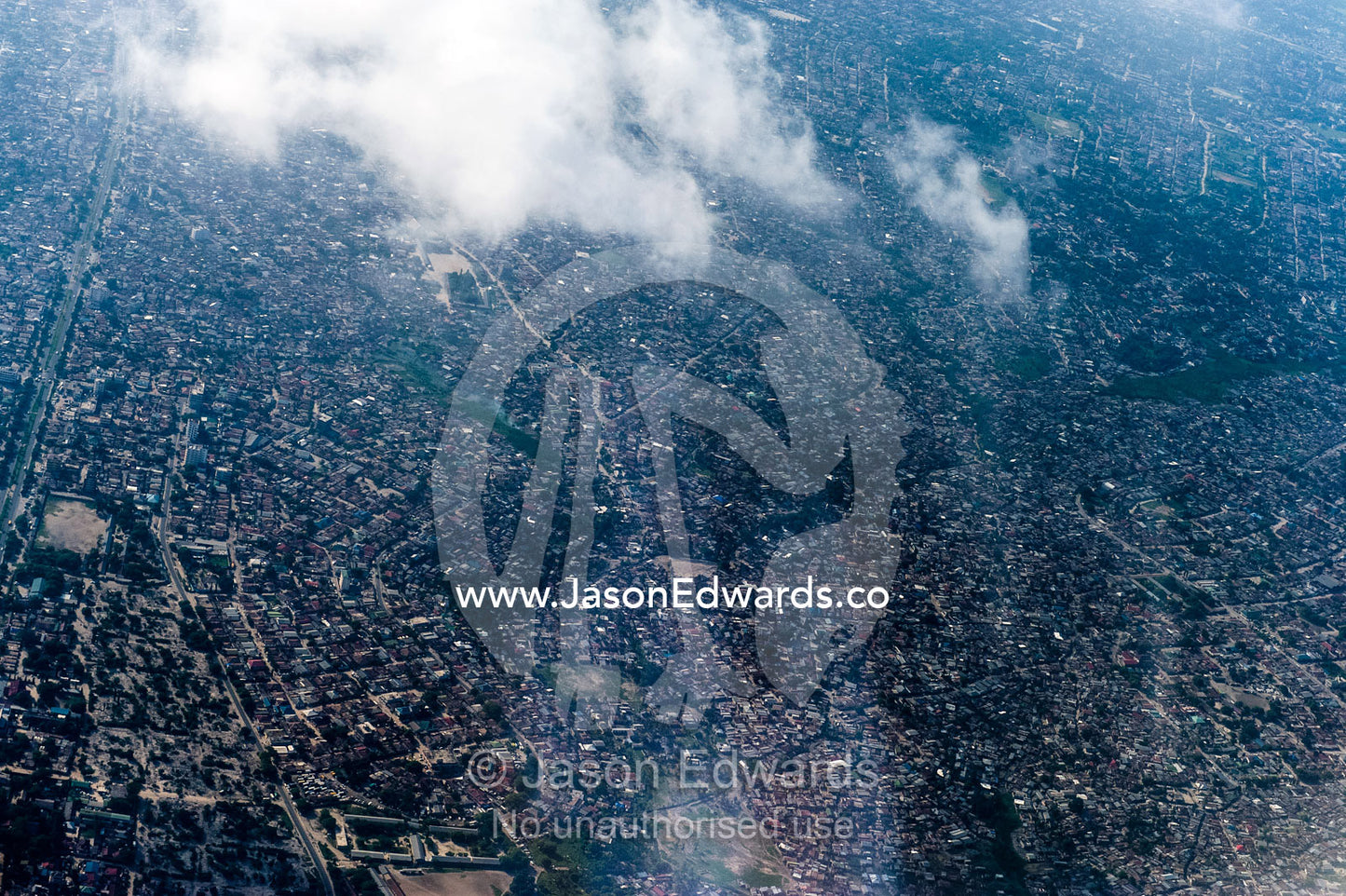 A densely populated suburban community crowded around Dar es Salaam's urban sprawl. Dar es Salaam, Tanzania.