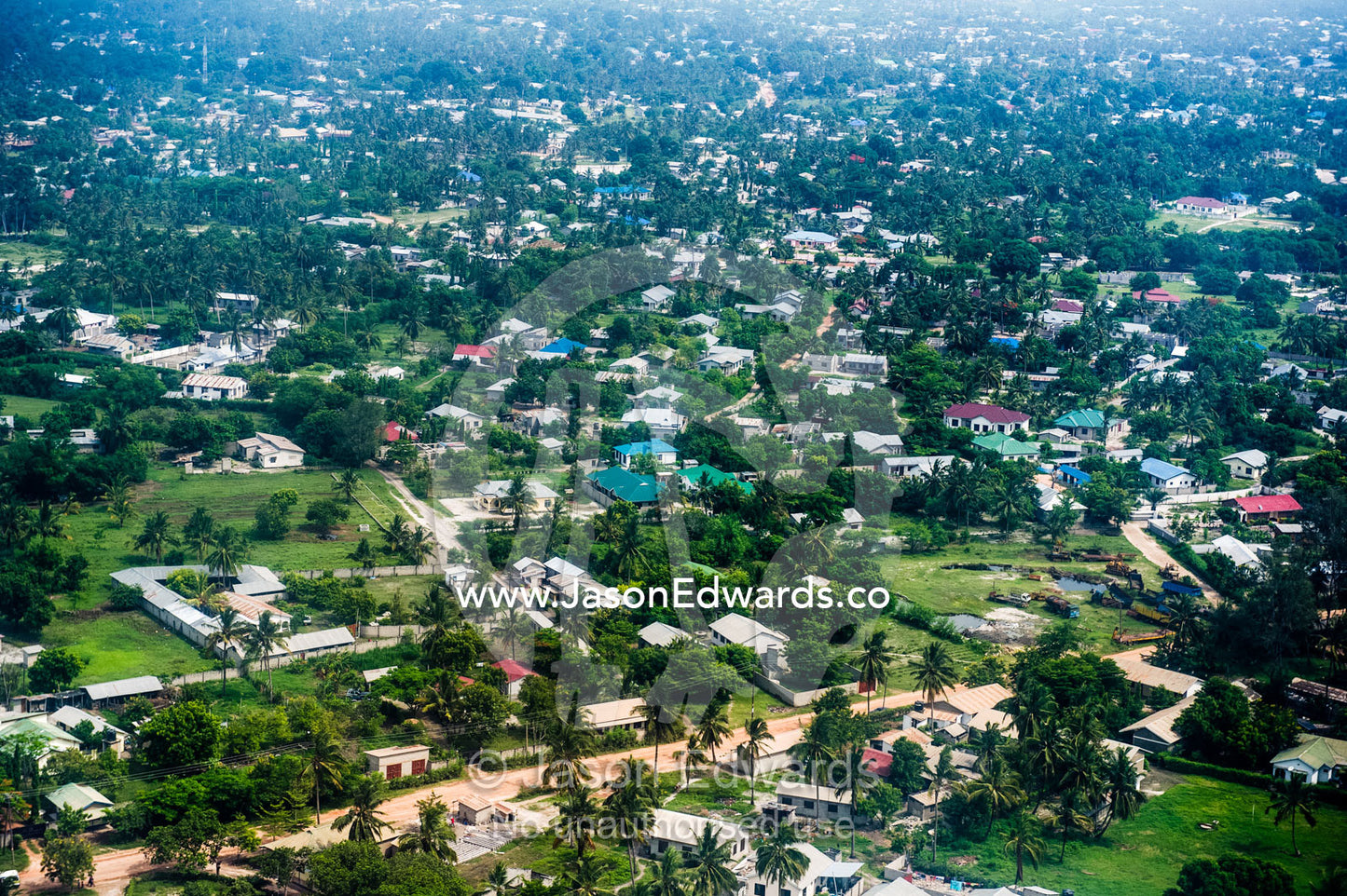 A tropical island suburban community crowded around Zanzibar Town's urban sprawl. Zanzibar Town, Zanzibar, Tanzania.
