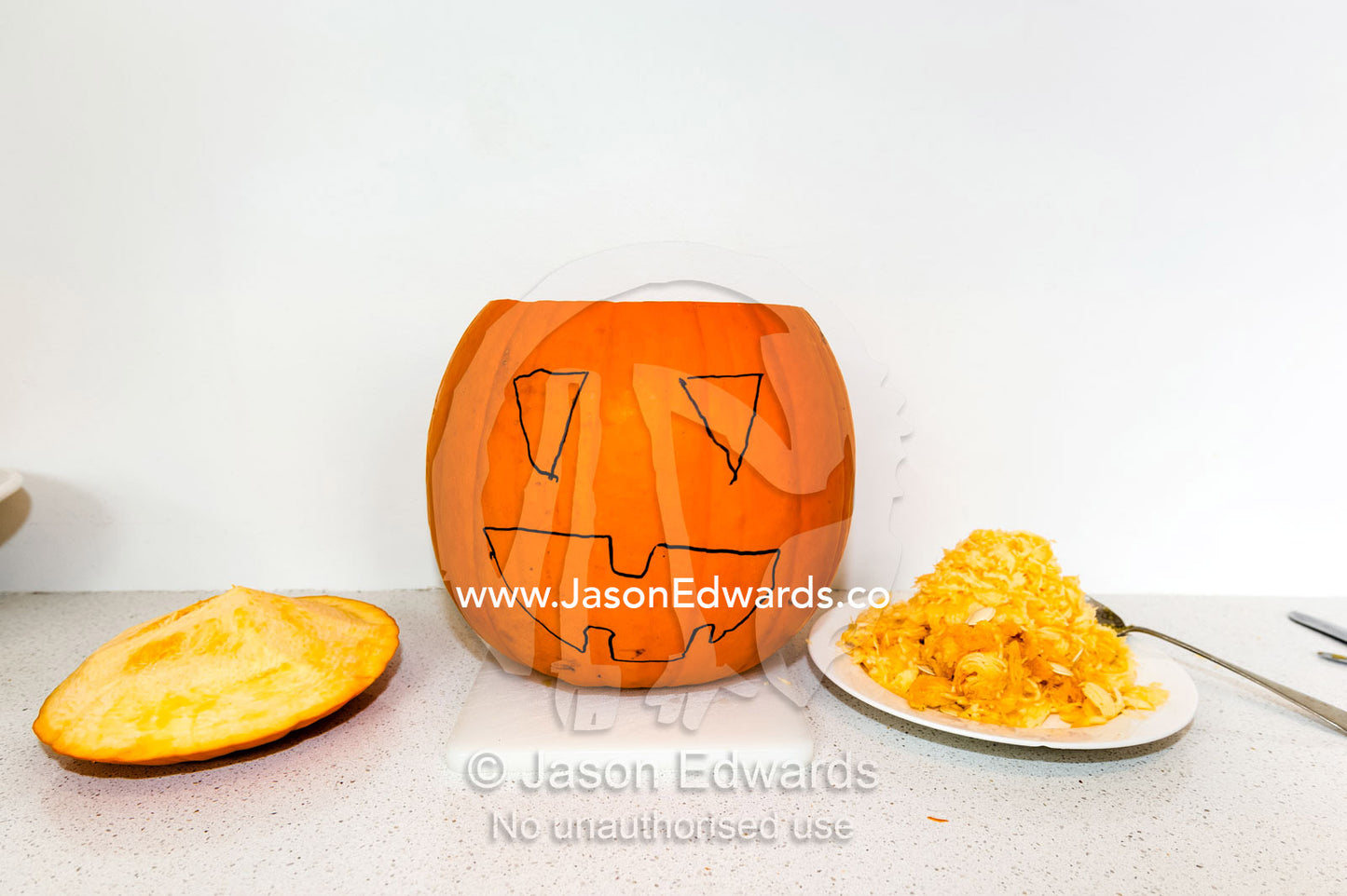 A face drawn on a jack-o'-lantern pumpkin for halloween celebrations. Carlton North, Melbourne, Victoria, Australia.