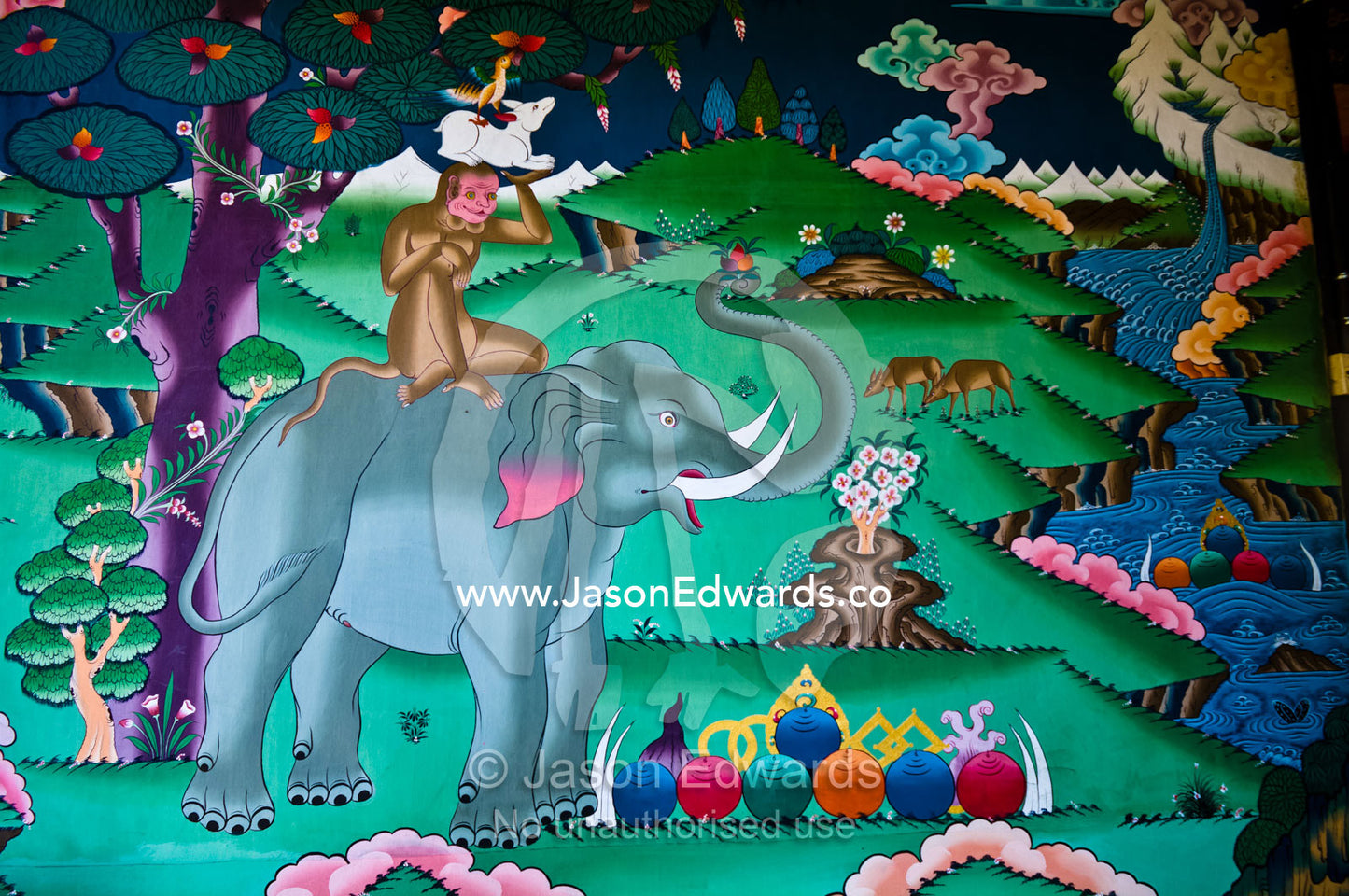 A colorful mural depicts the tale of the Four Harmonious Friends in a temple. Pangri Zampa Astrology School, Thimphu, Thimphu District, Bhutan.