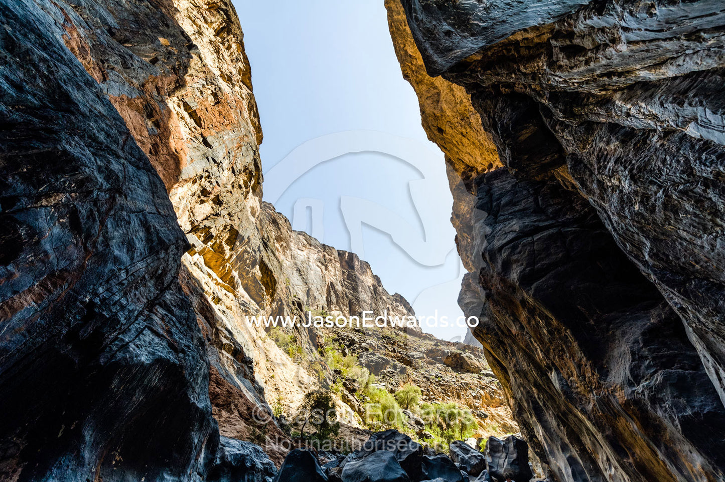 Erosion has carved a deep gorge in a desert mountain pass. Wadi Bani Awf, Snake Gorge, Western Hajar Mountains, Ad Dakhiliyah Region, Sultanate of Oman.