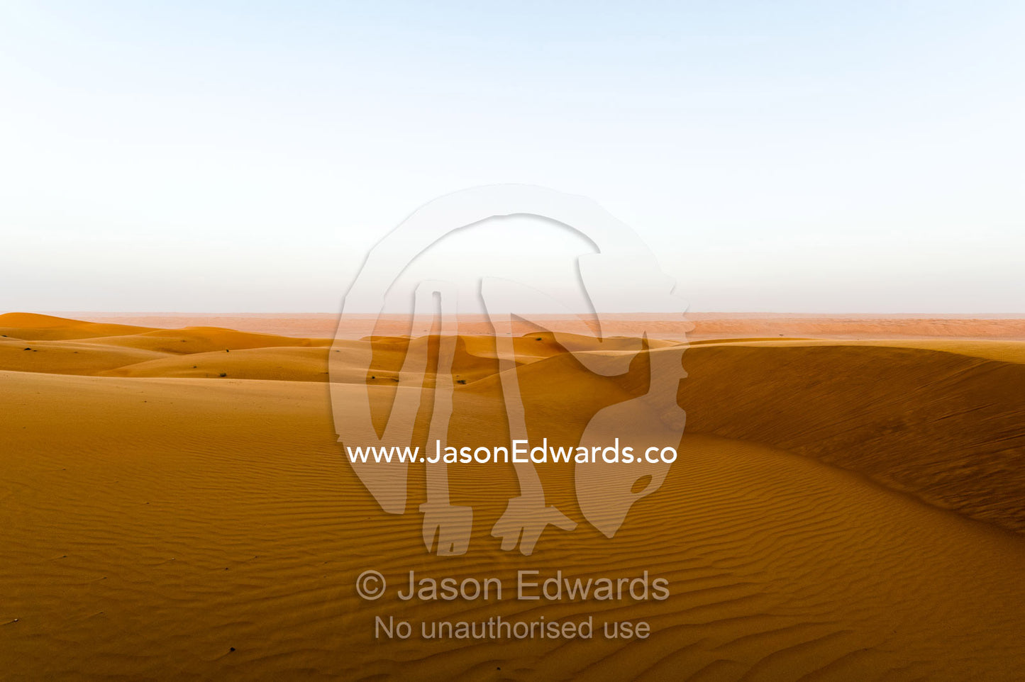 The plateau of a sand dune as night falls over the desert. Wahiba Sands, Ramlat al-Wahiba, Sharqiya Sands, Sultanate of Oman.