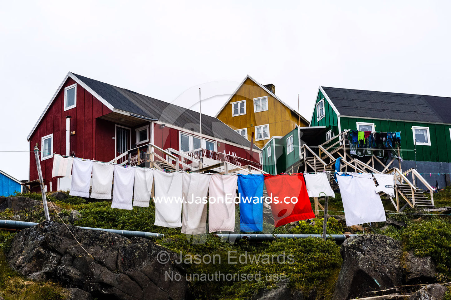 Laundry drying on a clothes line in an Arctic village. Kangaamiut, Gammel Sukkertoppen, Qeqqata Municipality, Greenland.